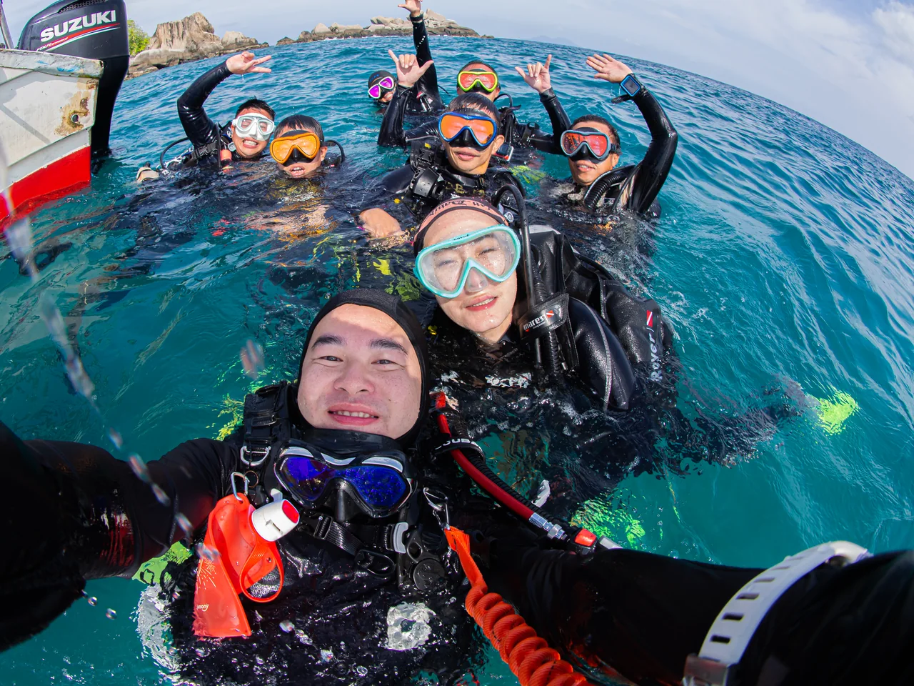 Dive Buddies Sharing Time in the Ocean