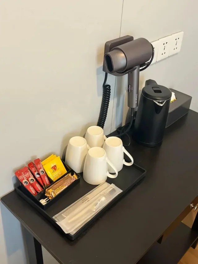 In-room kettle, cups and hairdryer at TDB Tioman Resort